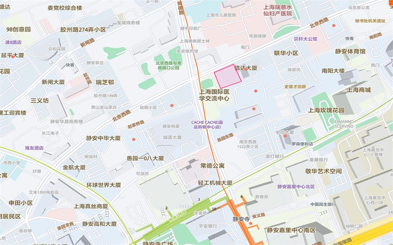 国立大厦，矗立于上海市静安区的繁华地段——北京西路1465号与常德路交汇处